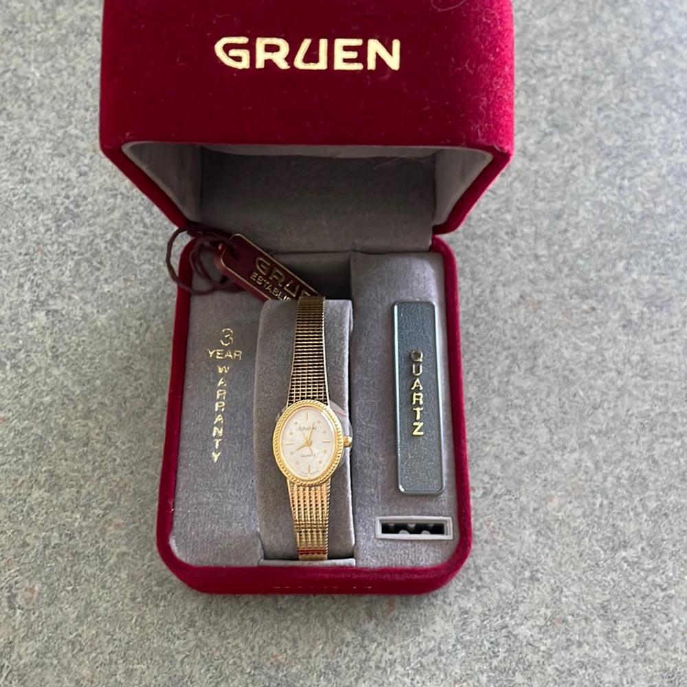 Vintage Gruen gold watch. Comes with box.